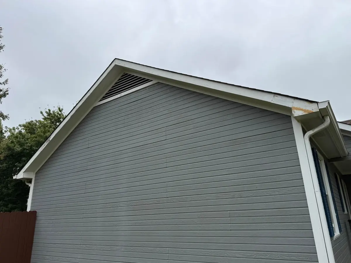 Side gable with fresh white trim